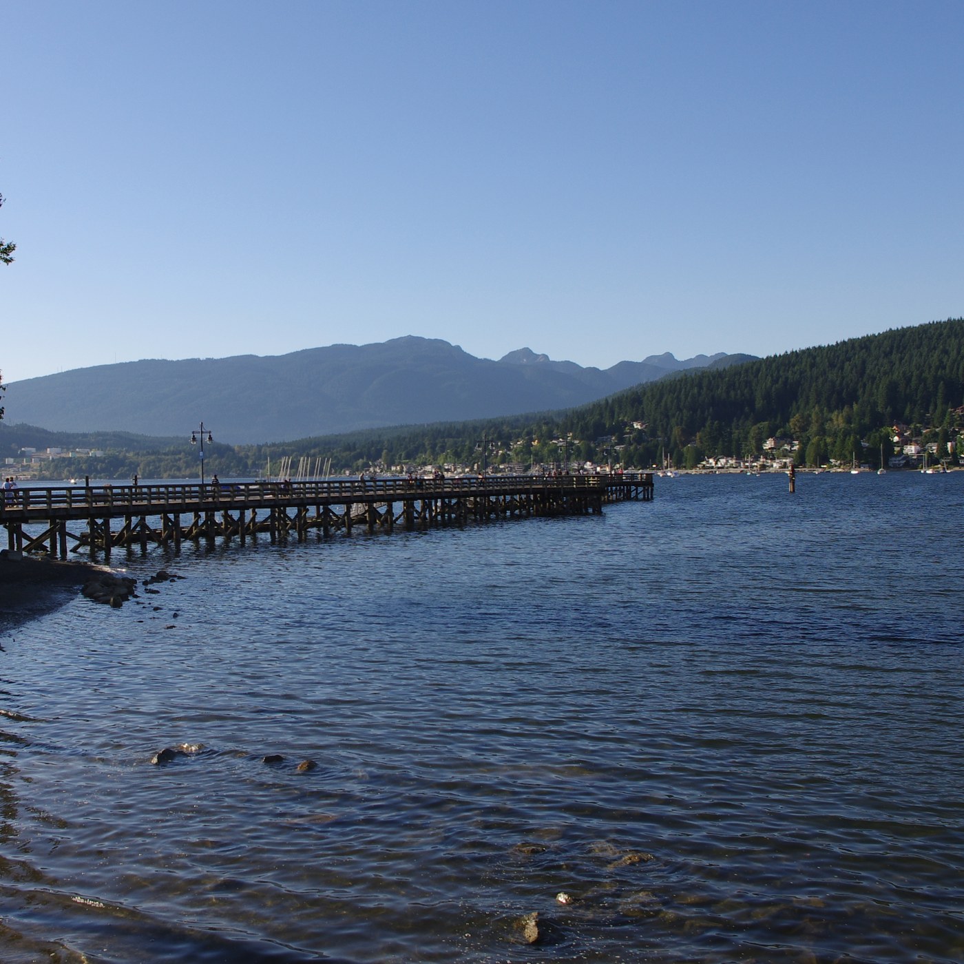 Rocky Point Park pier extending into Burrard Inlet in Port Moody, British Columbia